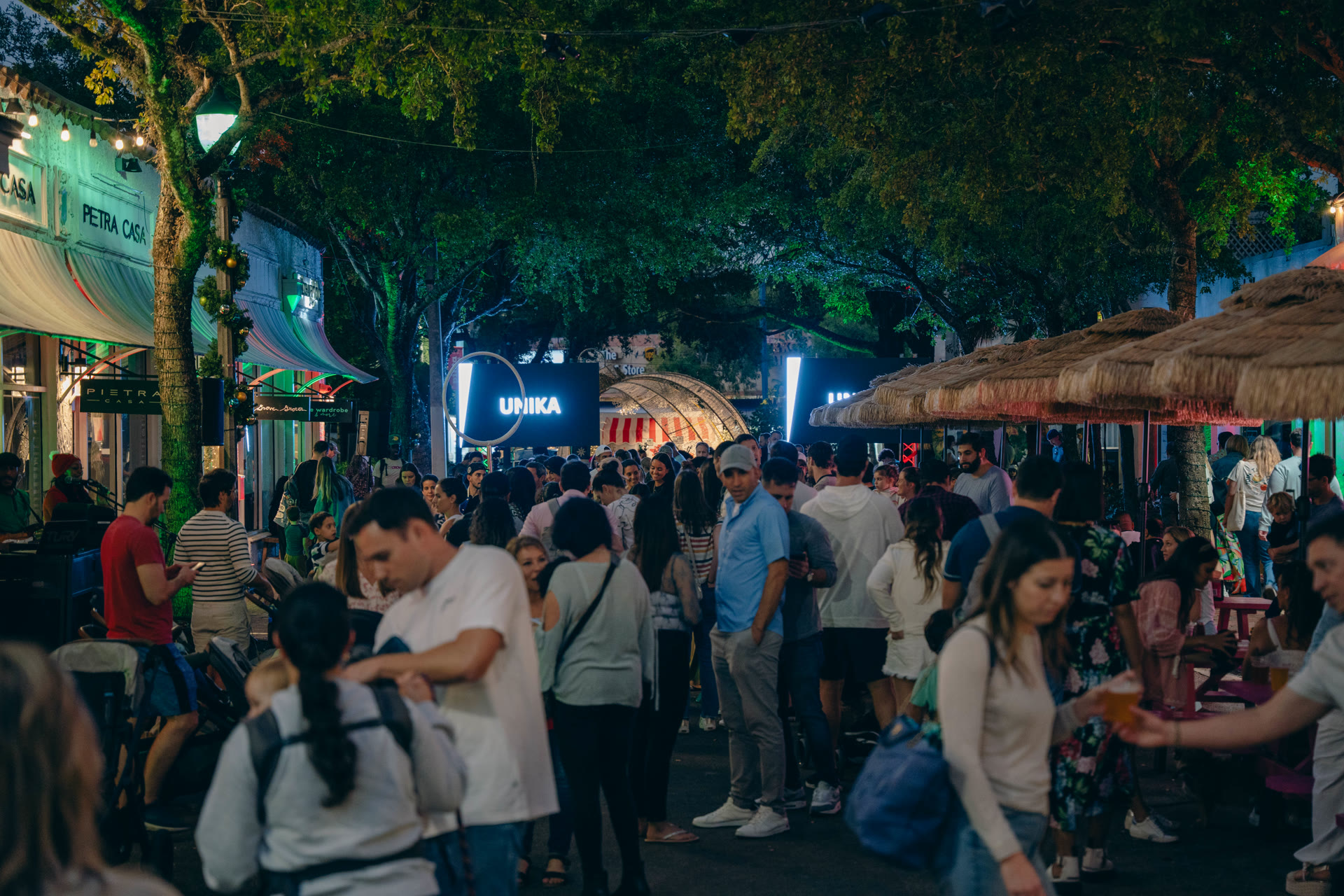 Street festival crowd at a Cocowalk Miami event produced by ATM