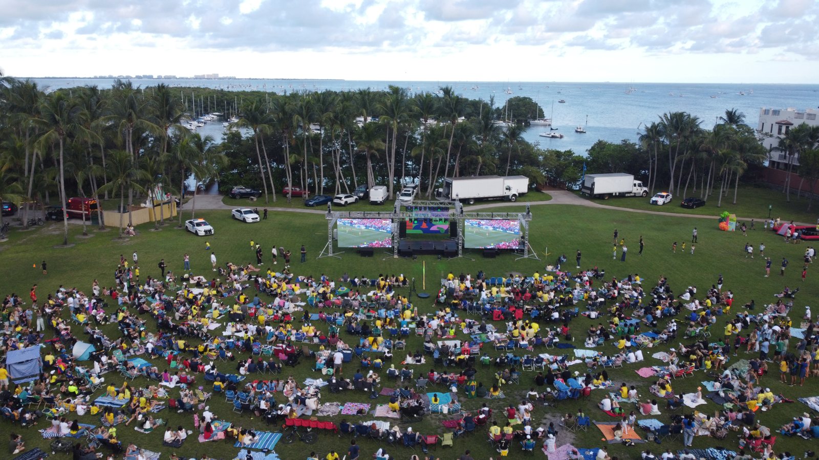 Aerial view of the crowd at Peacock Park facing the stage